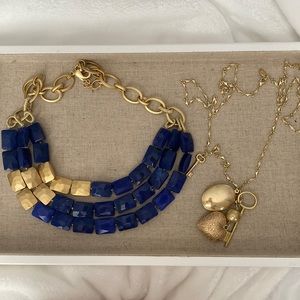 Two gold and blue necklaces